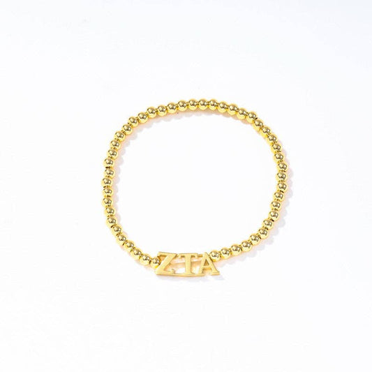 - Sorority: Gold Beaded Bracelet with Greek Letters on Stretch Cord