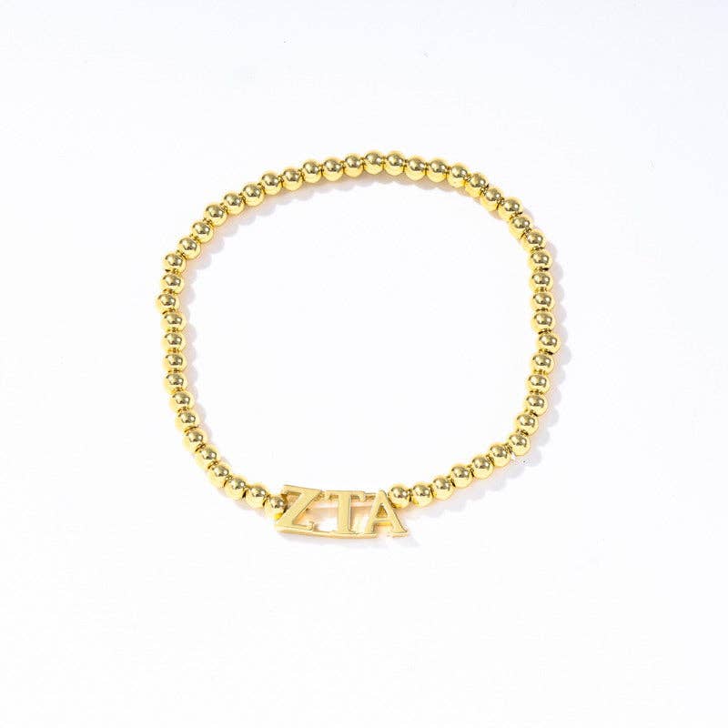 - Sorority: Gold Beaded Bracelet with Greek Letters on Stretch Cord