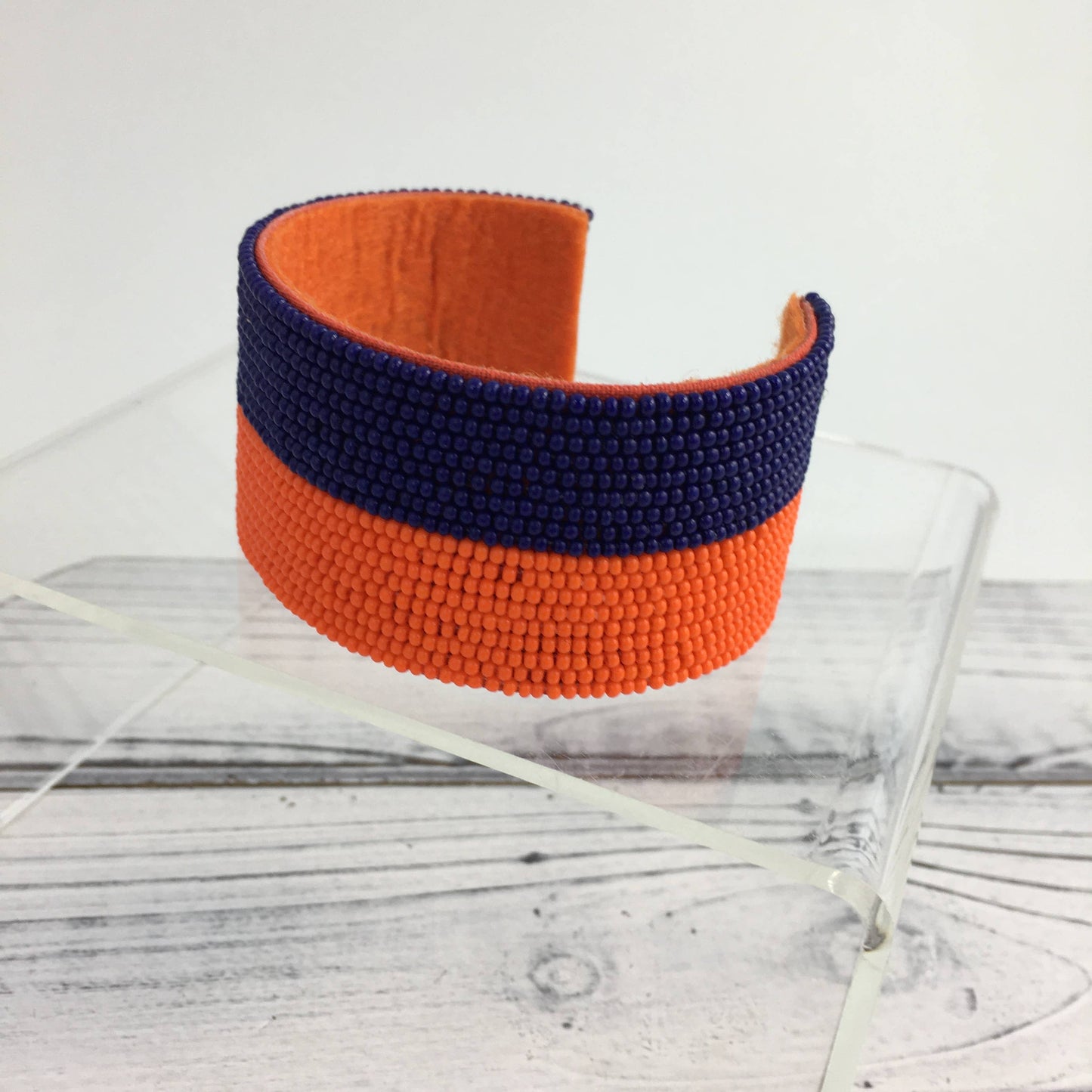 Orange and navy beaded cuff bracelet